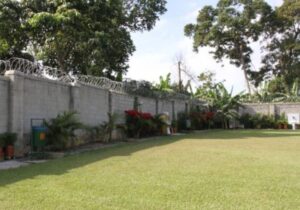 1.85 Acres Of Gardens Land For Sale In Entebbe Town With Lake View At 1.1m USD